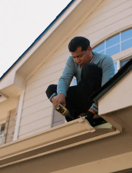 Workers install new roof